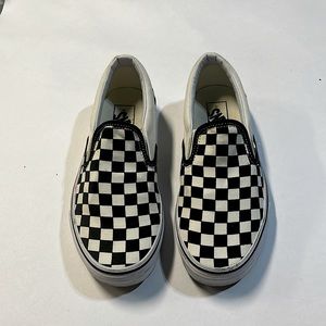 White and black checkered VANS. Size 7.5.